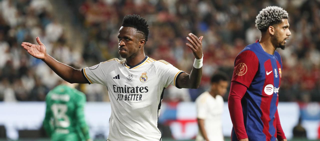 El brasileño Vinicius Júnior festeja uno de sus goles ante el Barcelona. 