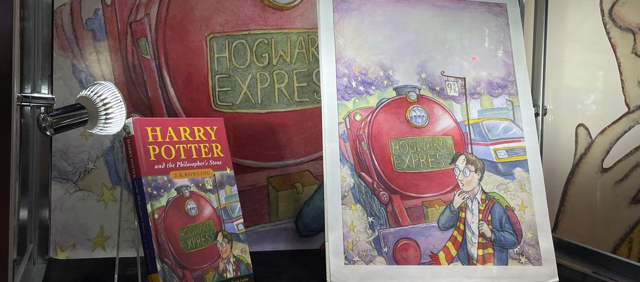 Libro y acuarela original de 'Harry Potter y la piedra filosofal'.
