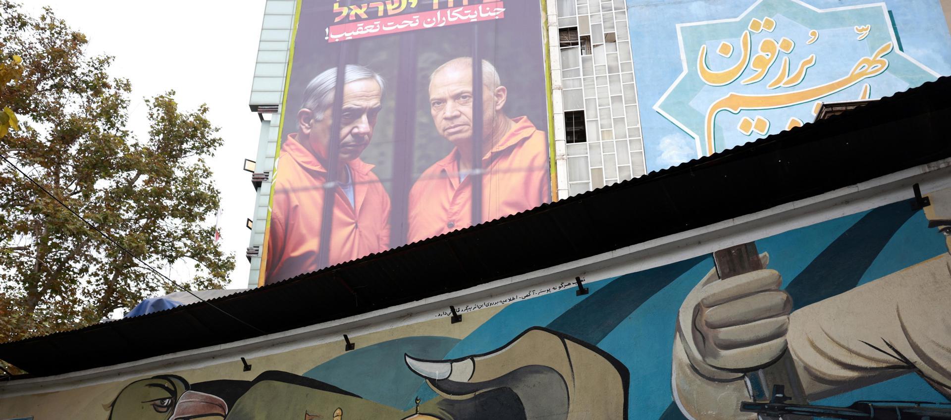 Pancarta del ministro israelí, Benjamín Netanyahu, y el exministro de Defensa, Yoav Gallant, en la Plaza Palestina de Teherán. 