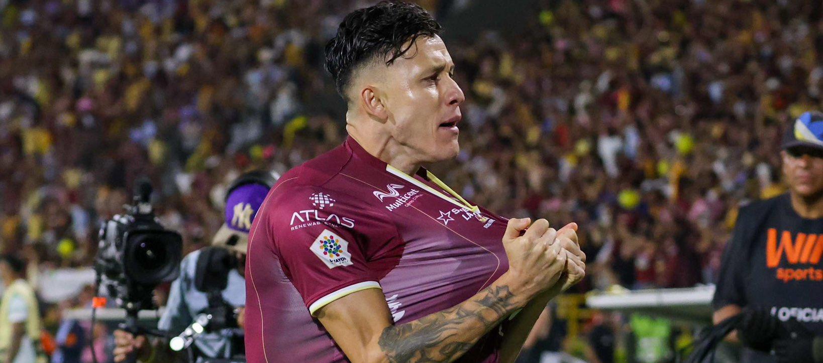 El paraguayo Gustavo Adrián Ramírez celebra el gol del empate del Tolima. 