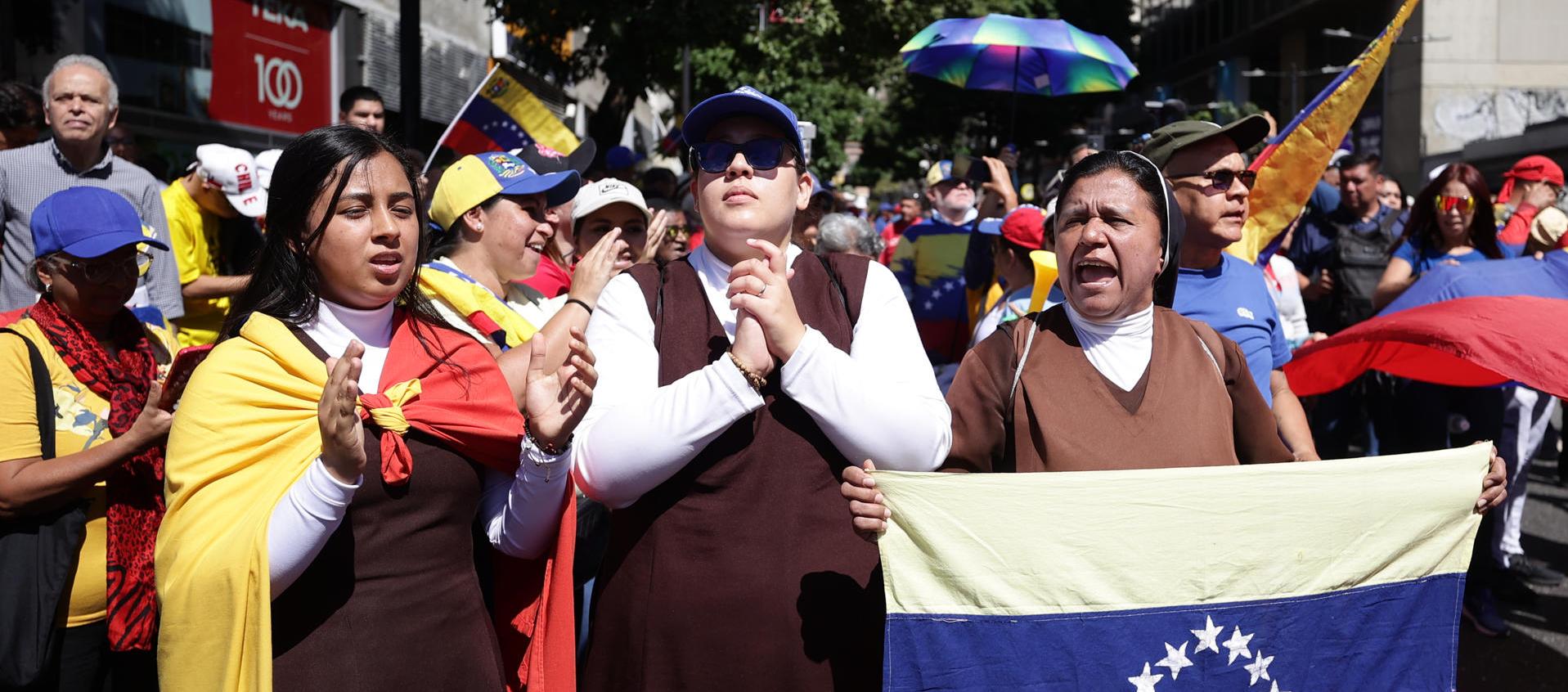 Venezolanos opositores en una manifestación, en Caracas.