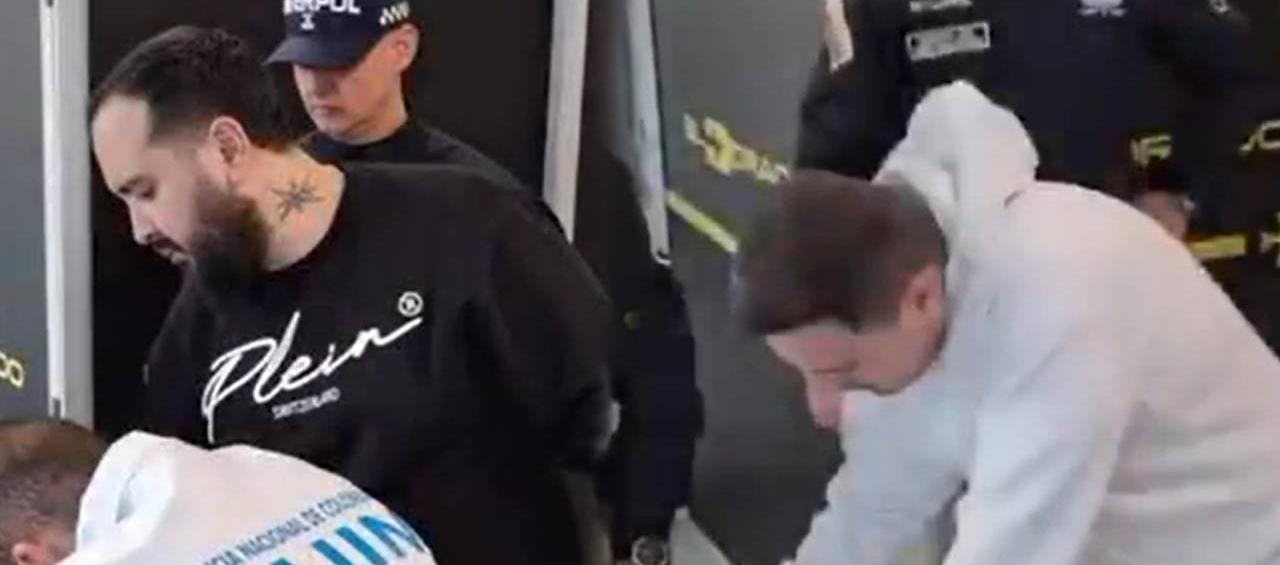 Dos de las personas extraditadas. 