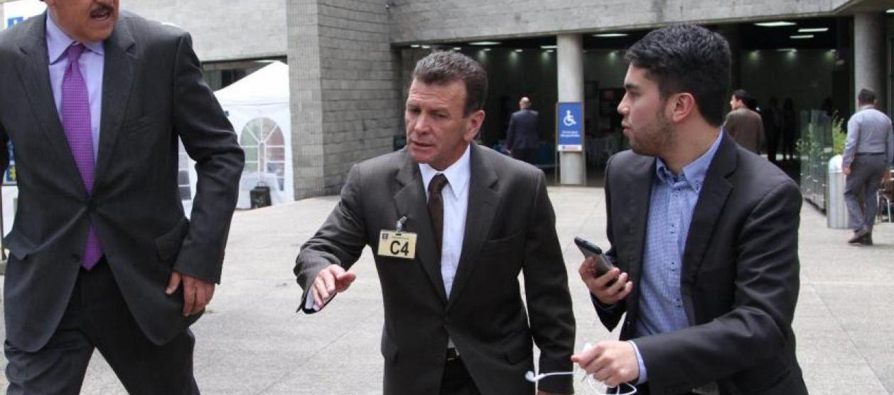 Expresidente de Saludcoop Carlos Gustavo Palacino Antia (centro). 