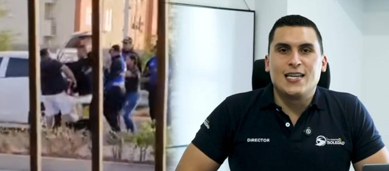 Agente de Tránsito de Soledad empujando a un conductor.