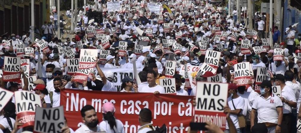 Marcha de comerciantes contra la extorsión. 