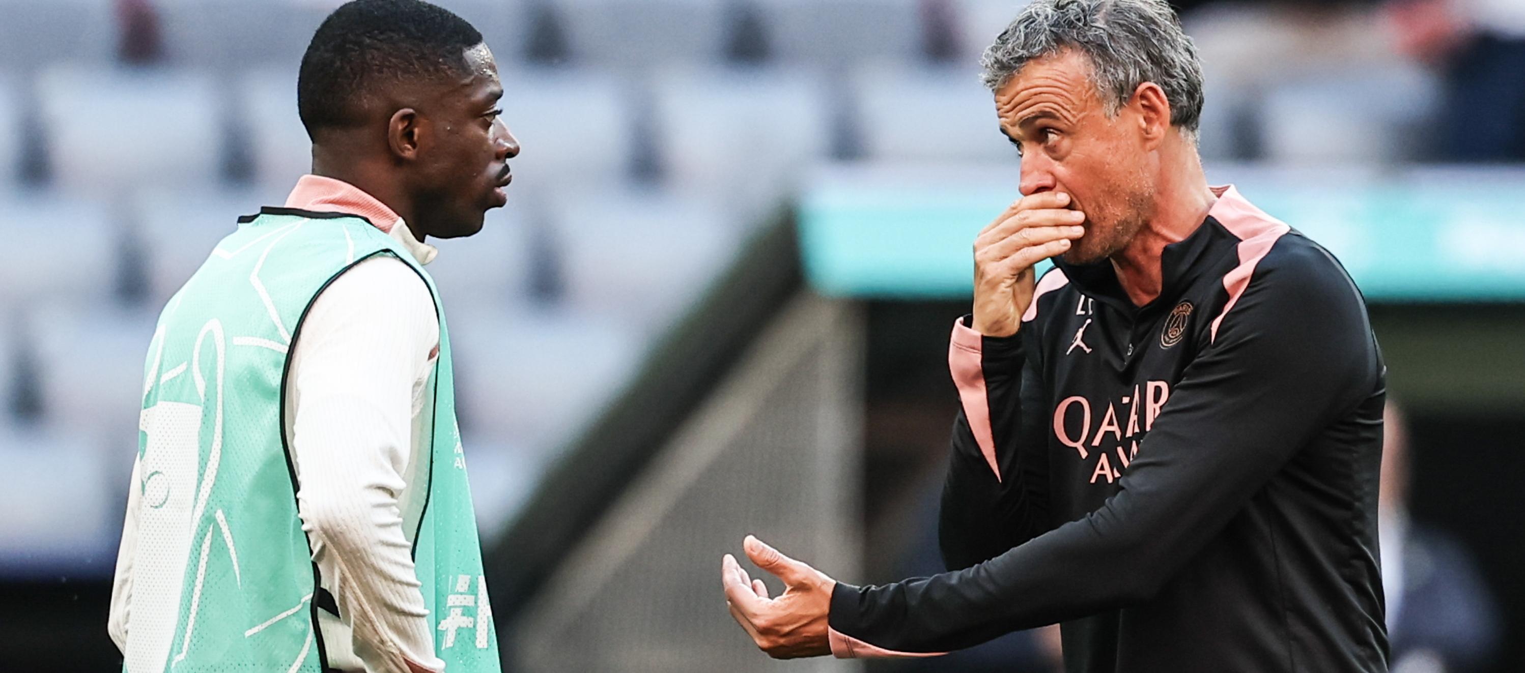 El español Luis Enrique, entrenador del PSG, con el delantero Ousmane Dembelé.  
