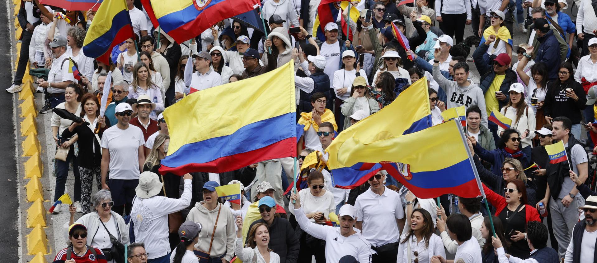 Ciudadanos durante su participación en la marcha. 