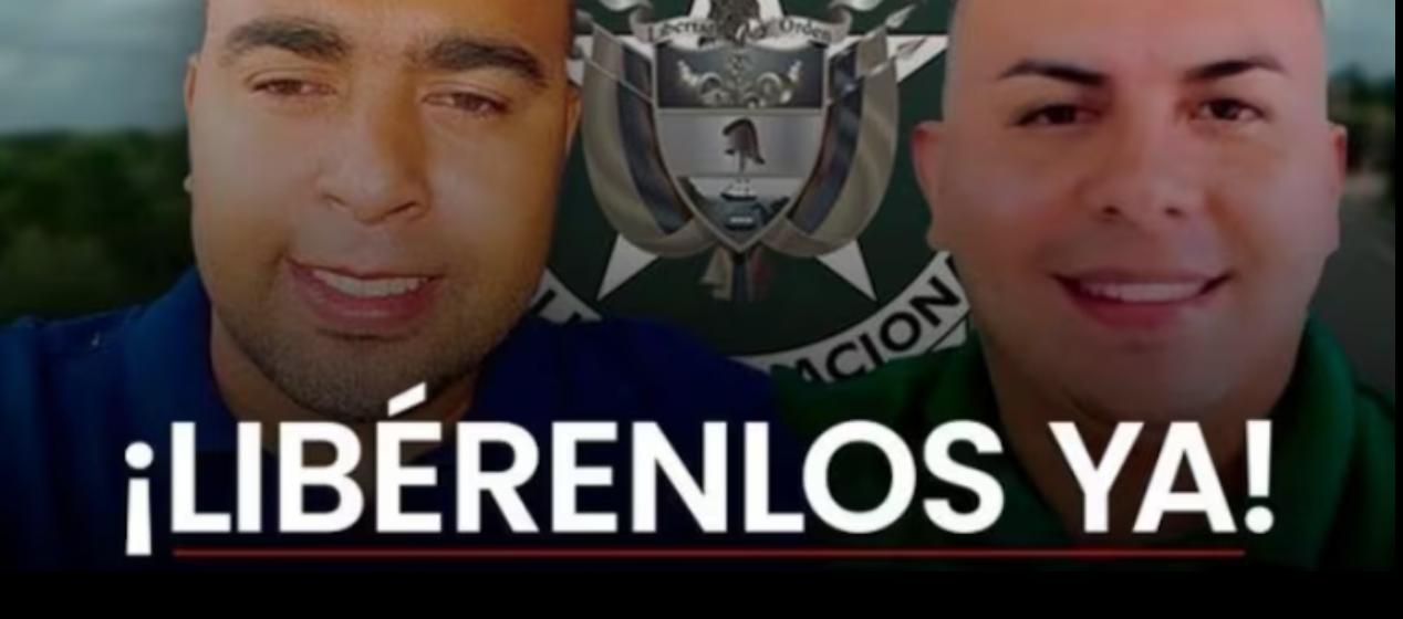 El subintendente Franque Esley Hoyos Murcia y el patrullero Yordin Fabián Pérez.