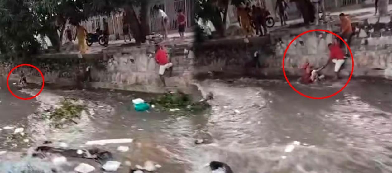 Momento del rescate del niño en el arroyo Don Juan. 