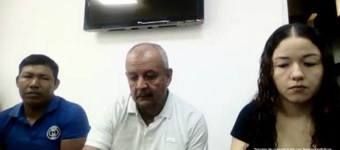 Los tres imputados durante las audiencias preliminares. 