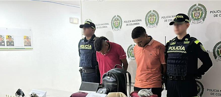 Dos de los capturados por parte de la Policía. 