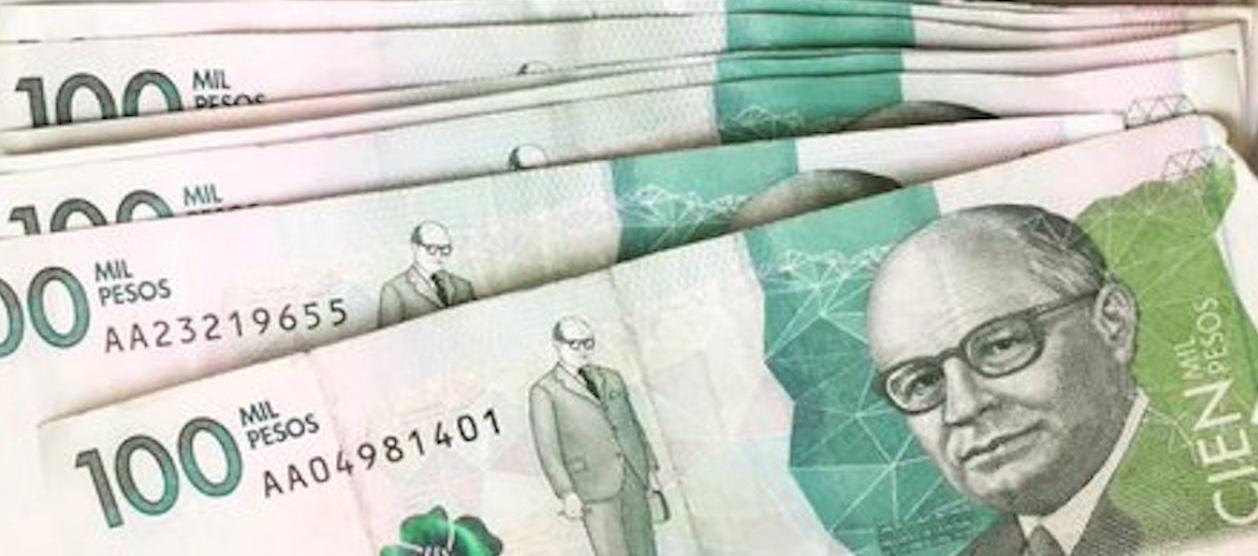 Billetes de 100 mil pesos. 