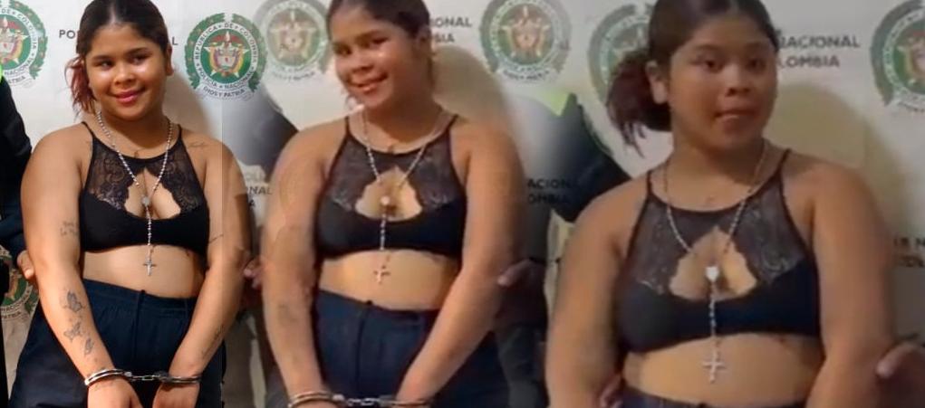 La mujer posando tras ser capturada por la Policía. 