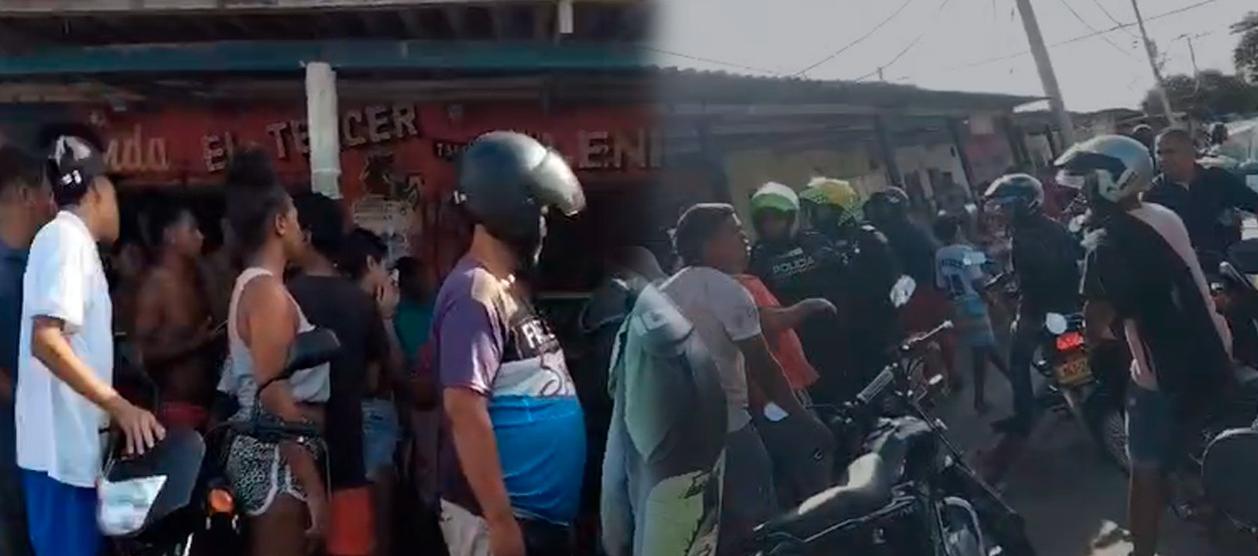 La comunidad aglomerada en el lugar donde fue impactado a bala el niño. 