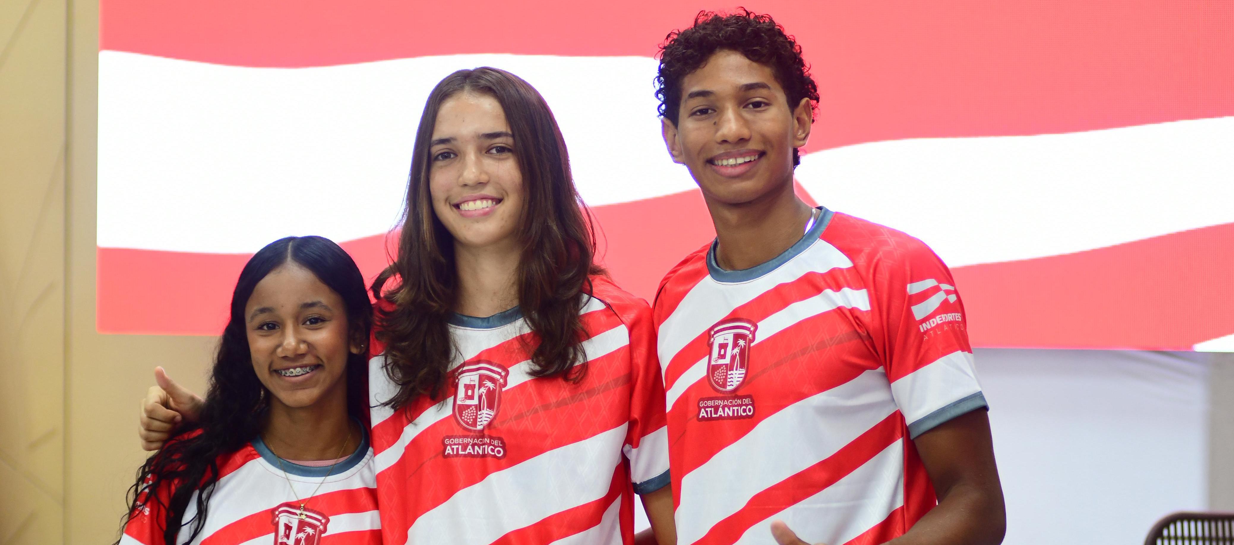 La atleta Laura Alcalá. la basquetbolista María Millán y el nadador Omar Crueche.