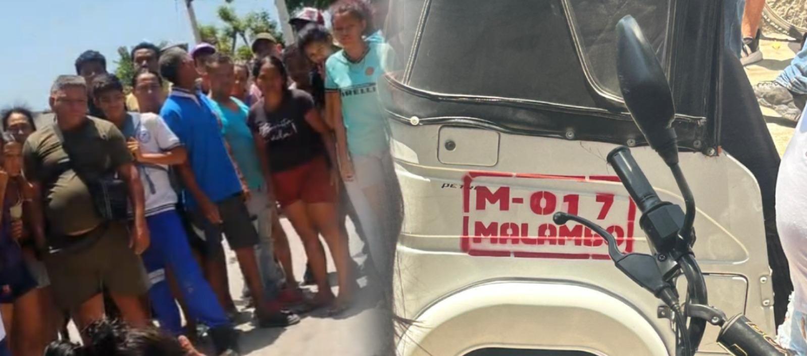 Personas en el lugar donde quedó muerto el joven y el motocarro que conducía. 