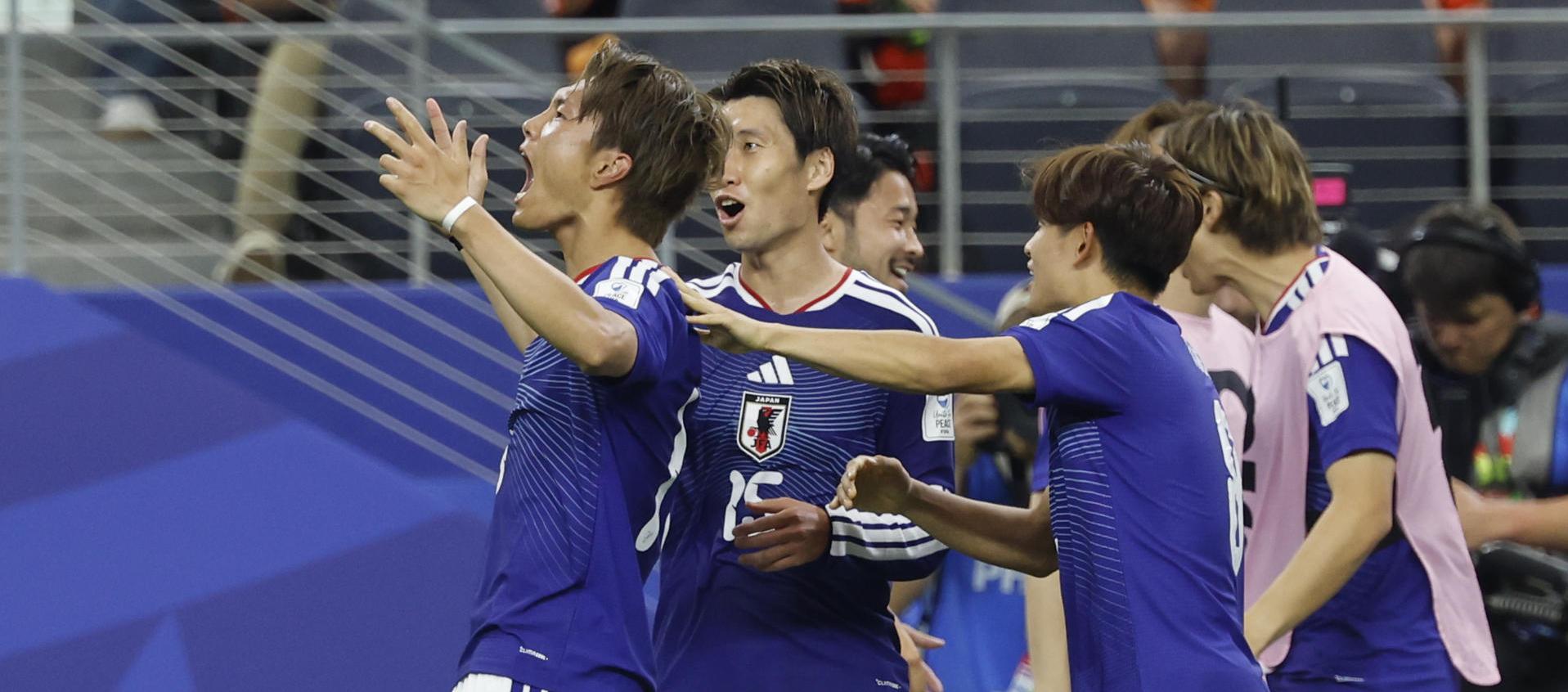 Jugadores de Japón celebrando su empate ante Países Bajos.