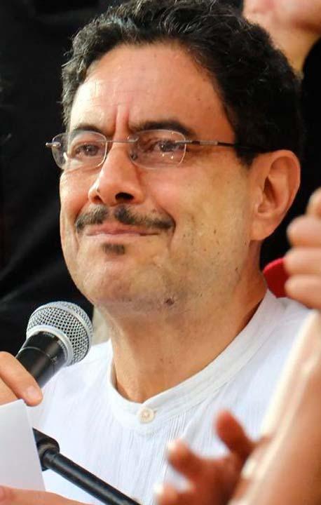 Alias 'Calarcá' y el candidato Iván Cepeda.
