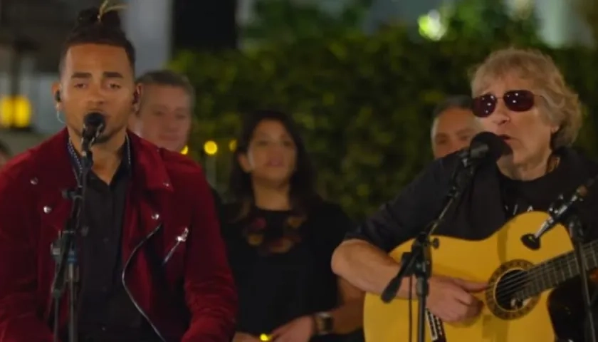 Los cantantes Ozuna y José Feliciano.
