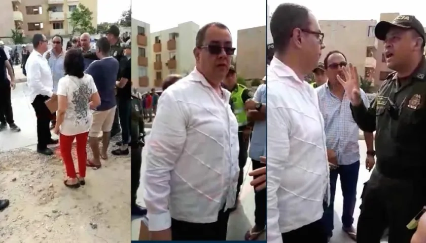 Un oficial de la Policía requiriendo al abogado de la empresa para atender a los propietarios.