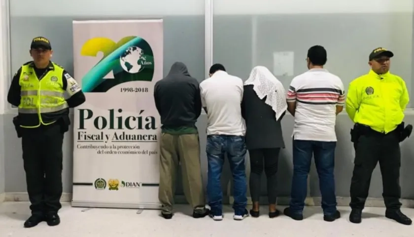 Los cuatro capturados en el operativo.