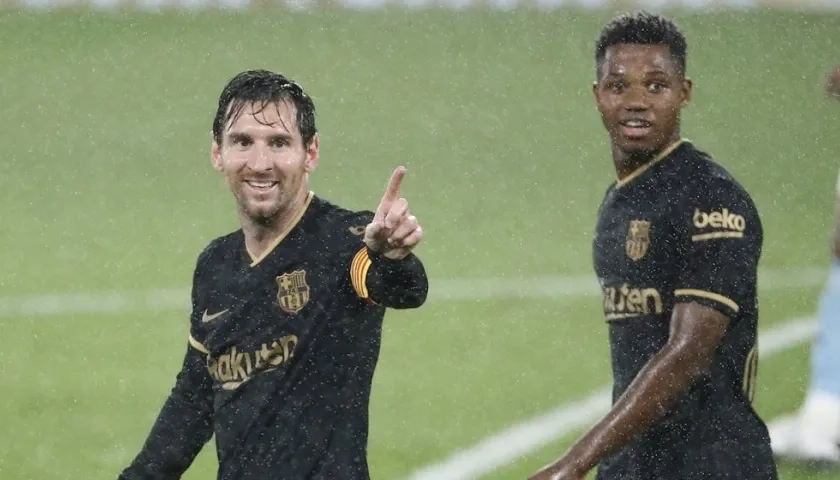 Lionel Messi y Ansu Fati.