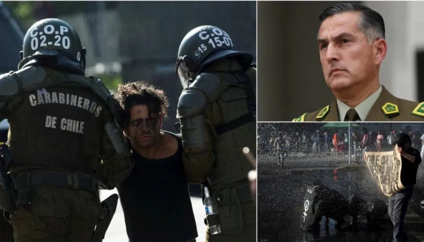 Carabineros detienen hoy a un manifestante durante una protesta junto al Palacio de La Moneda, en Santiago (Chile).