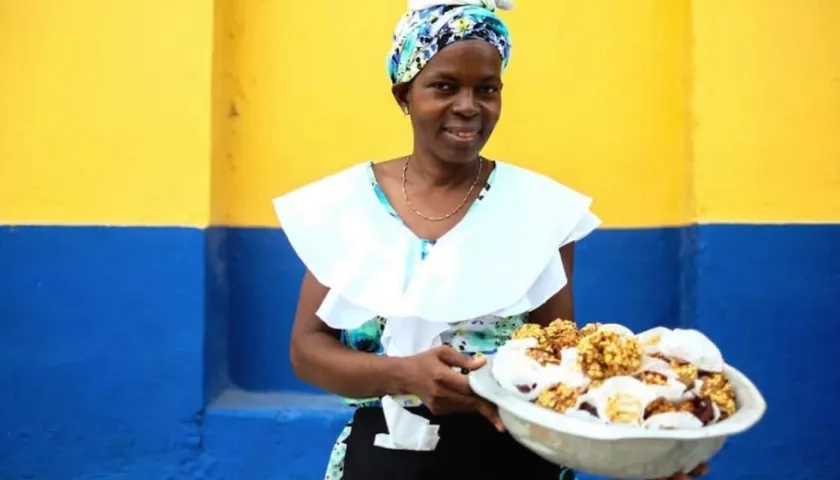 Una venddora con los tradicionales dulces.