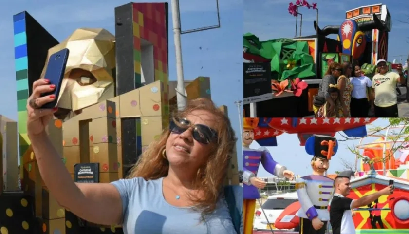 Varios turistas aprovechan para pasar un rato en familia y tomarse fotos.