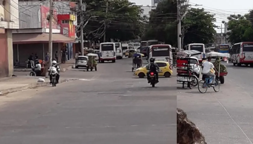 Buses de las dos empresas en la carrera 38 entre calles 33 y 35.