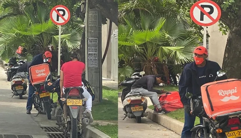 Domiciliarios parqueados en zona prohibida.
