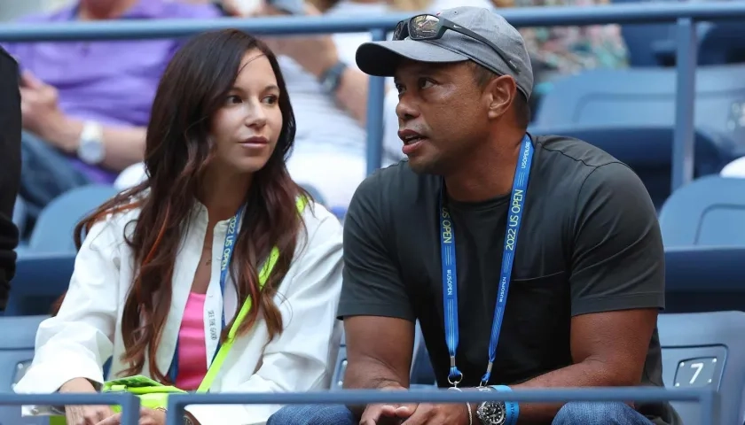 Erica Herman y Tiger Woods.