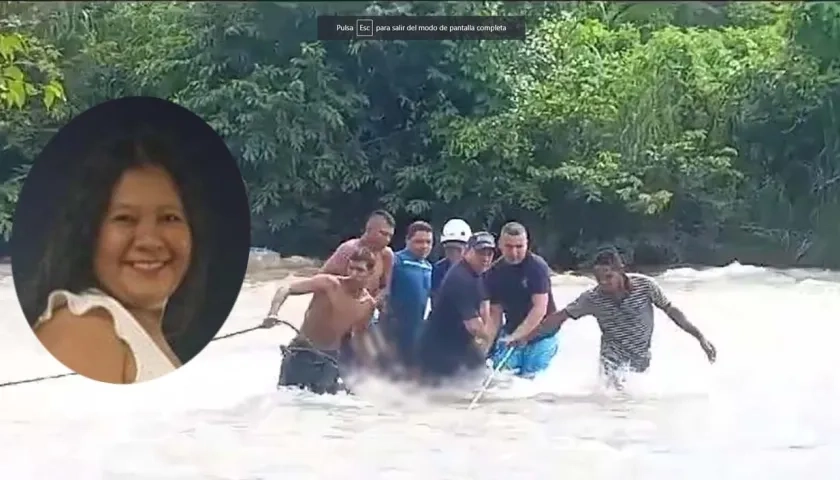 María López en momentos en que era rescatada del río Guatapurí