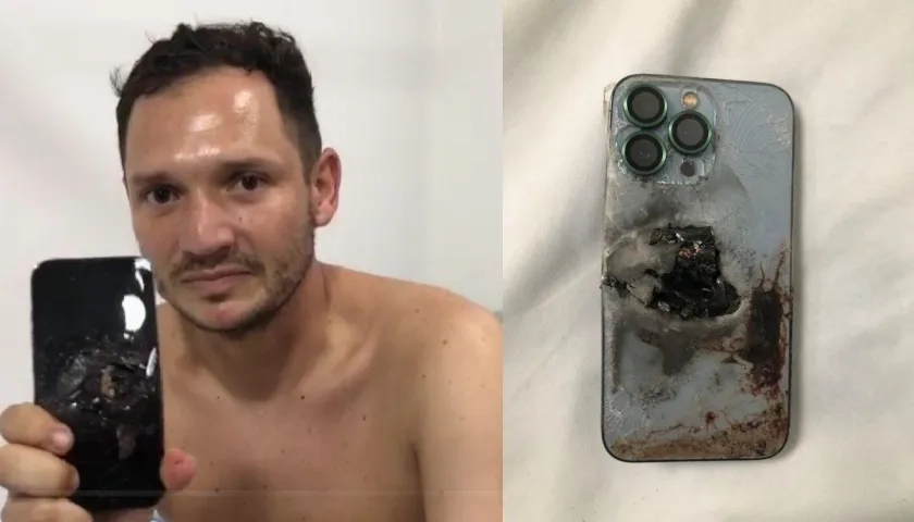 El capitán muestra el celular que le salvó la vida. 