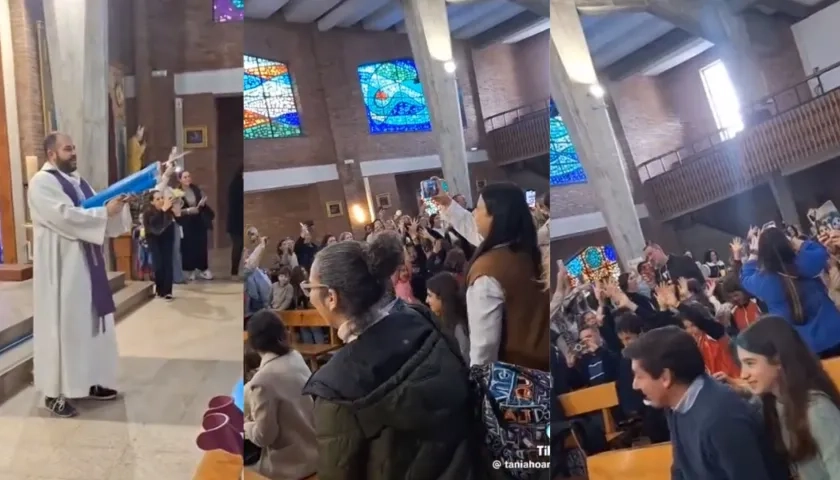 Párroco bendice a los niños de la iglesia con una pistola de agua.