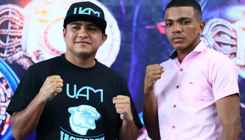 Román 'Chocolatito' González y Robert Barrera durante un encuentro promocional de su pelea. 