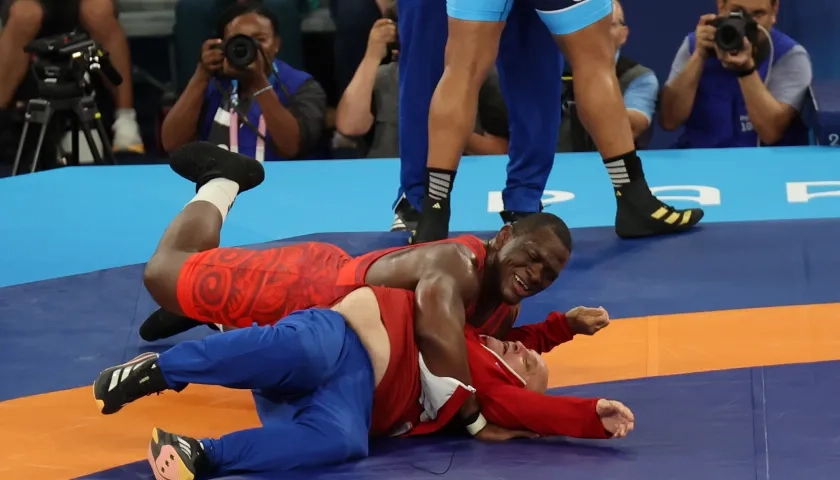 Mijaín López durante su combate contra el chileno Yasmani Acosta. 