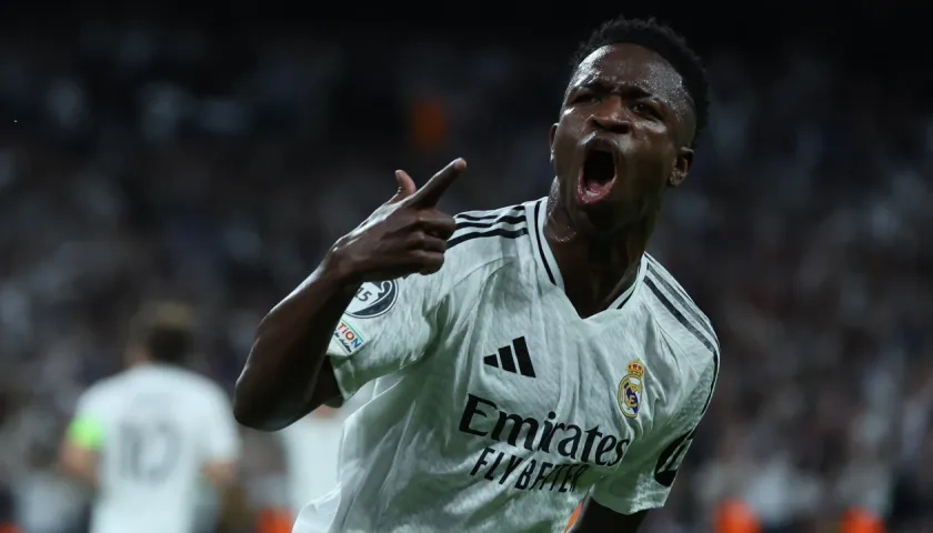 El brasileño Vinicius Junior festeja uno de sus goles ante el Dortmund.