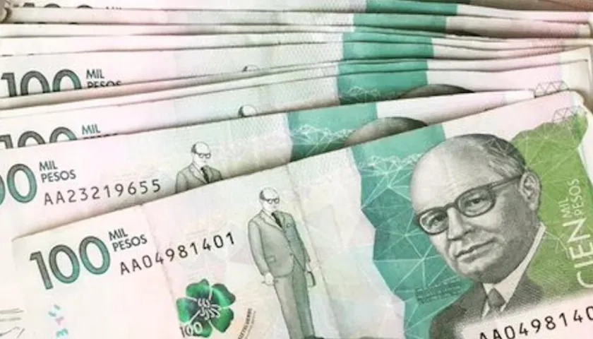 Billetes de 100 mil pesos. 