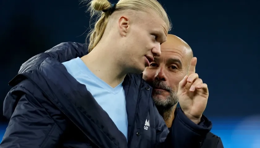 Erling Haaland y Pep Guardiola.