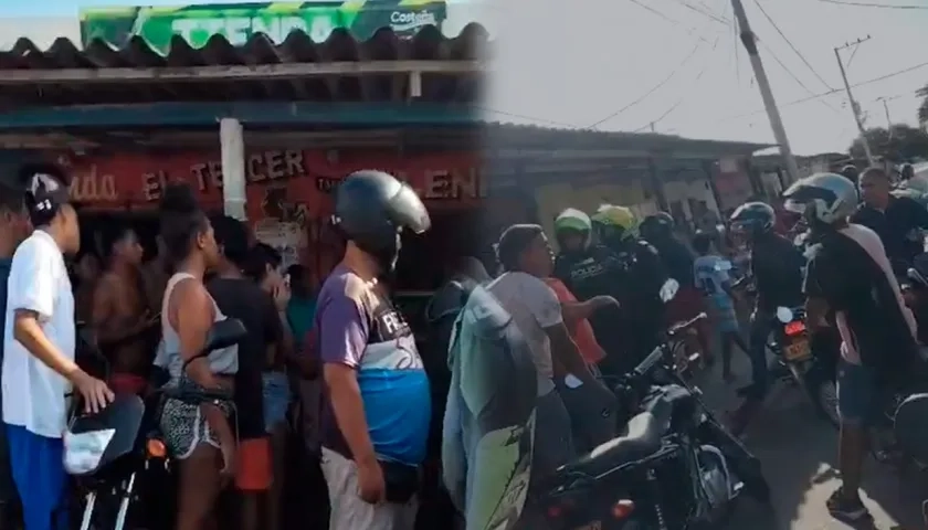 La comunidad aglomerada en el lugar donde fue impactado a bala el niño. 