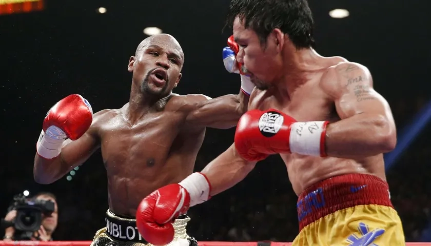 Mayweather y Pacquiao en su primera pelea, efectuada el 2 de mayo de 2015.