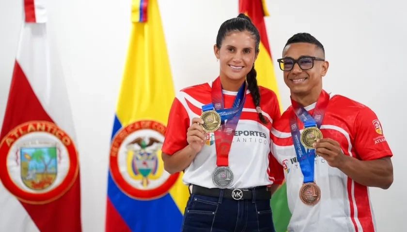 La tenista María Paulina Pérez y el pesista Duván Ferrer, medallistas de oro en los Juegos Centroamericanos y del Caribe.