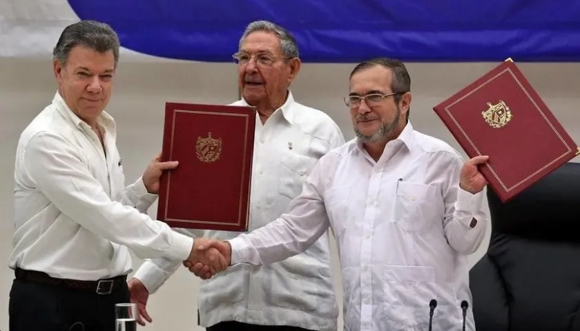 Expresidente Juan Manuel Santos y Rodrigo Londoño.