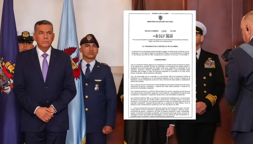 El Ministro de Defensa, Jorge Mora, y la imagen del Decreto.