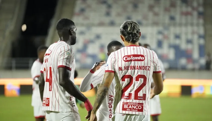 Jugadores del América celebran la clasificación.