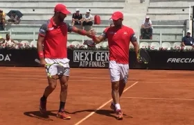 La pareja de Juan Sebastian Cabal y Robert Farah se impuso 3/6 6/4 10/4 sobre Sousa y Carreño.