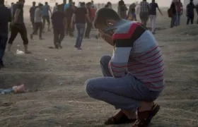 Palestinos lloran por sus muertos en Gaza.