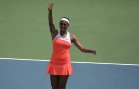 Mónica Puig festejando su triunfo. 