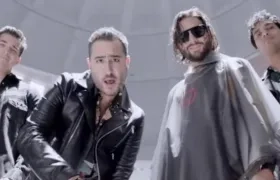 El grupo de Reik y el cantante Maluma.